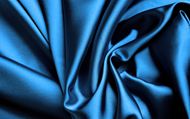 蓝色褶皱布料背景图片