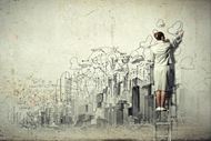 美女建筑师手绘城市蓝图图片