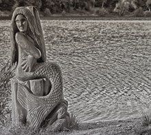 黑白美人鱼石雕图片