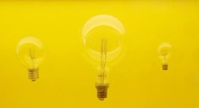 电灯泡黄色背景图片素材