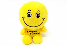 微笑黄色玩具布偶高清图