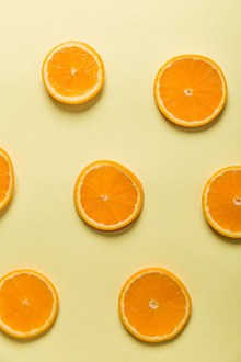 黄色橙子切片背景高清图片