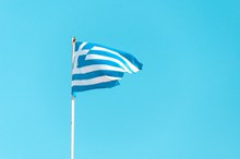旗杆上的希腊国旗图片素材