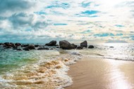 落日海滩海浪景观图片