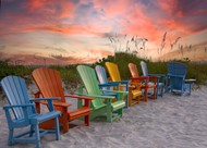 黄昏沙滩彩色沙滩椅图片下载