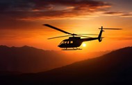 日暮黄昏夕阳余晖直升机剪影高清图片